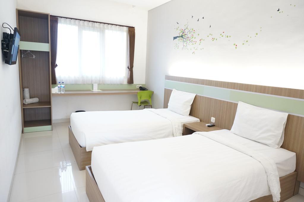 Rumah Cassa Guest House Surabaya Szoba fotó